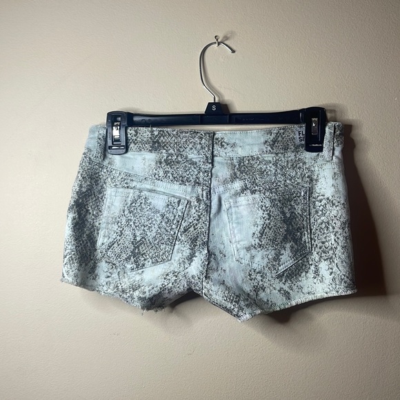 Reverse-able shorts one side is flowers, other side is ashy color. Size 1. - Picture 4 of 4